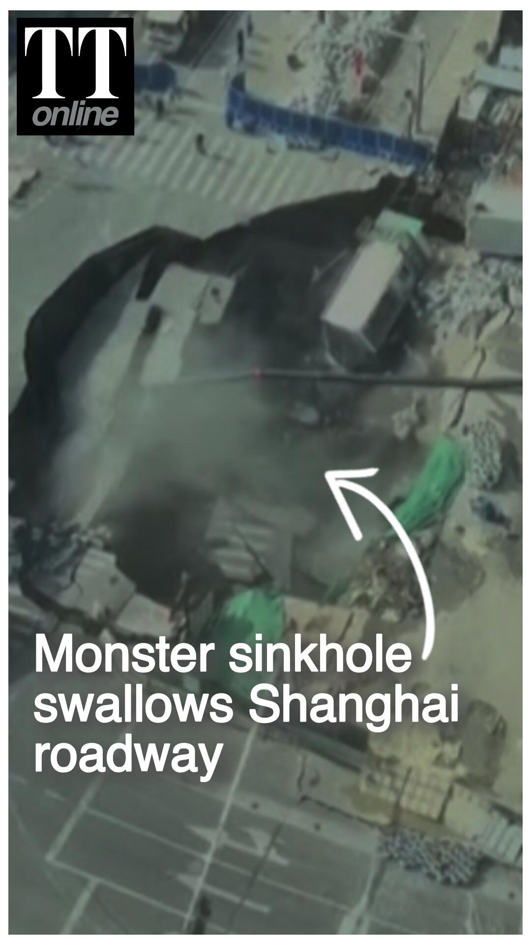 Watch | Moment a Massive Sinkhole Swallowed Large Part of a Road in Shanghai